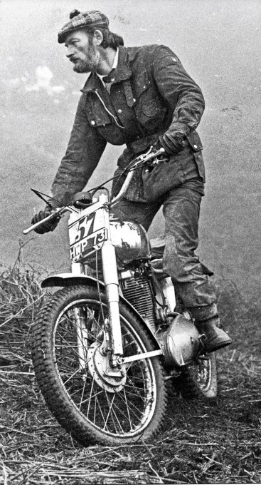 dm on his 1949 ex works 350 re. reg_ hwp 731 - red