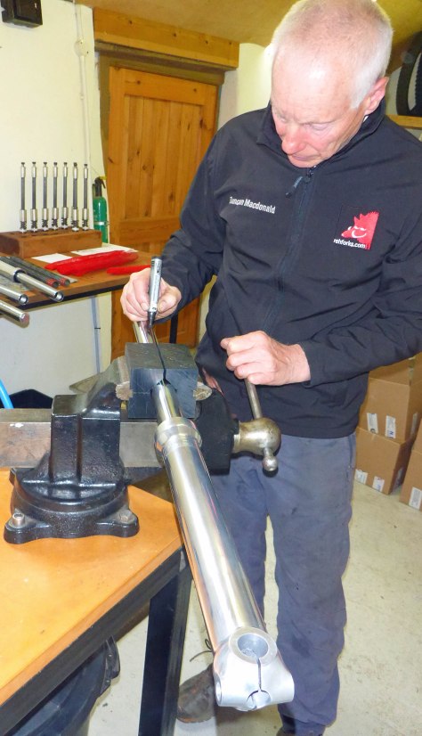 Writing the customer name on the stanchion